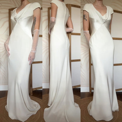 Ivory short sleeve figure hugging wedding dress uk 10