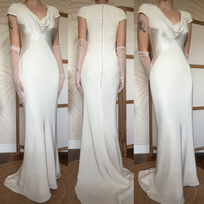Ivory short sleeve figure hugging wedding dress uk 10